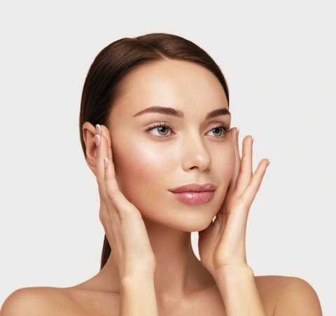 Beautiful woman with perfect, glowing skin by Bowie Medical Studio